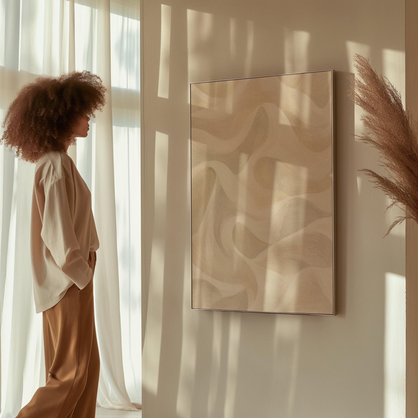Flowing silky wave shapes in ivory and warm white, canvas wall art seen in a warm interior with natural light