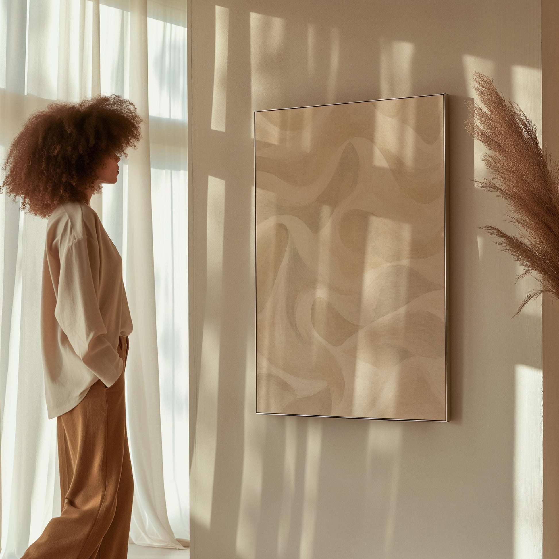 Flowing silky wave shapes in ivory and warm white, canvas wall art seen in a warm interior with natural light
