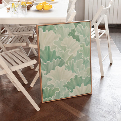 Fan shaped leafy forms in soft sage green watercolor, canvas print presented in a light, minimal room