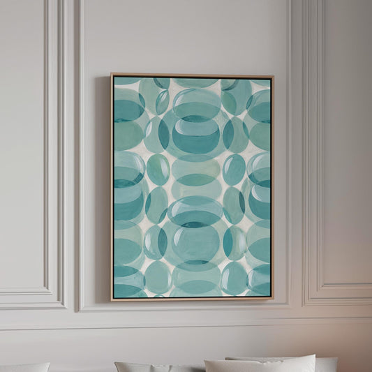 Overlapping translucent circles in teal and aqua tones, canvas print in a bright room with natural daylight