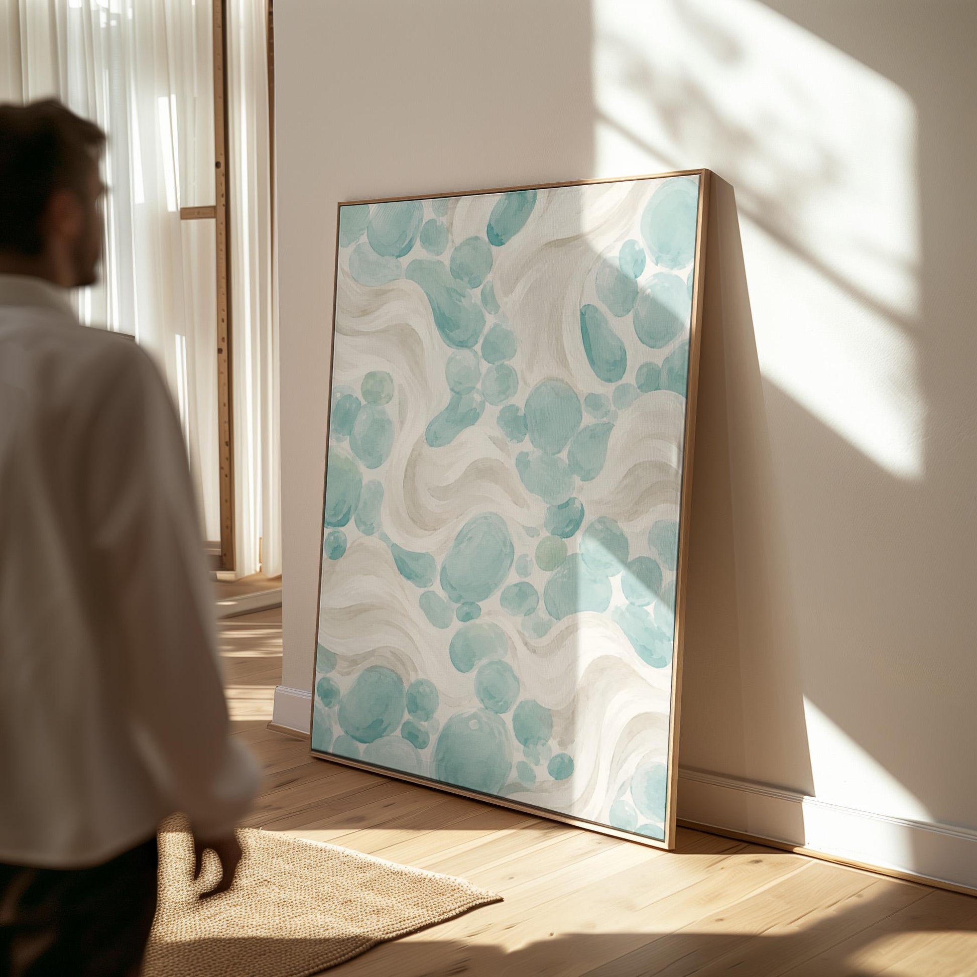 Aqua pebble shapes drifting among soft cream waves, canvas wall art on a quiet wall in a considered interior