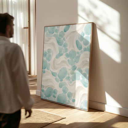 Aqua pebble shapes drifting among soft cream waves, canvas wall art on a quiet wall in a considered interior