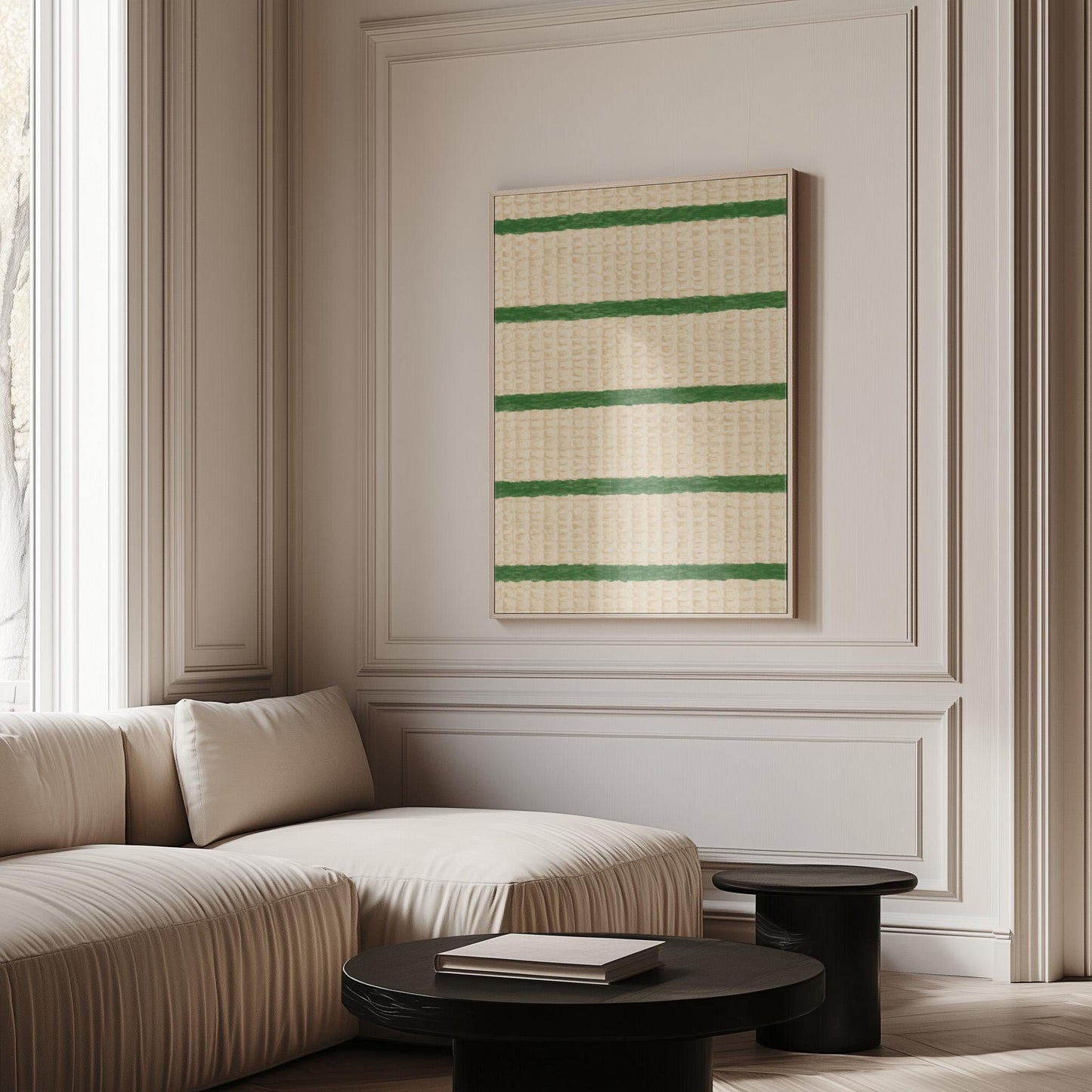 Horizontal grass green stripes on a cream background, canvas print displayed on a neutral wall in a styled interior