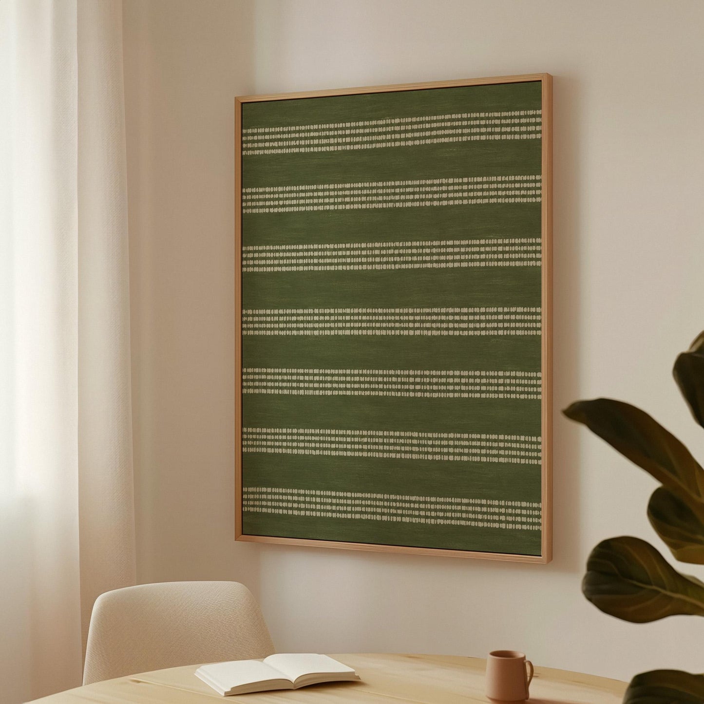 Olive green field with thin cream pinstripe rows, canvas print seen in a warm interior with natural light