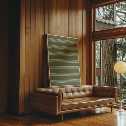 Olive green field with thin cream pinstripe rows, canvas print on a quiet wall in a considered interior