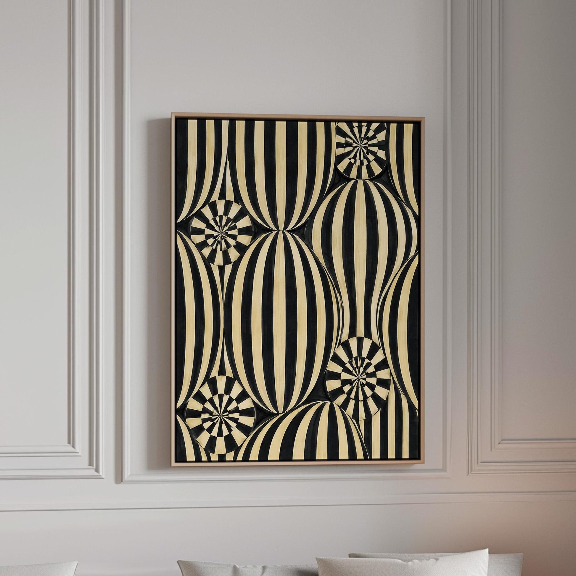 Optical illusion of striped spheres in black and cream, canvas print in a bright room with natural daylight
