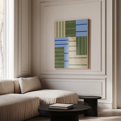 Patchwork of sage green fields with periwinkle blue bands, canvas print displayed on a neutral wall in a styled interior