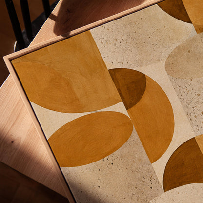 Warm caramel geometric shapes on speckled cream background, canvas print in a warm, minimally styled interior