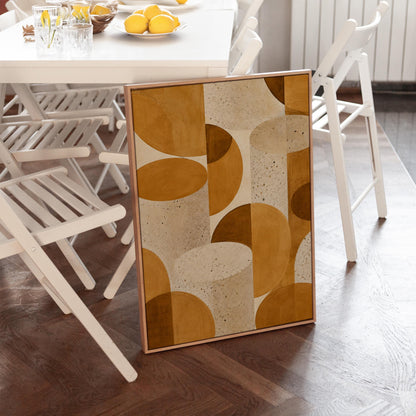 Warm caramel geometric shapes on speckled cream background, canvas print shown in a sunlit, contemporary room