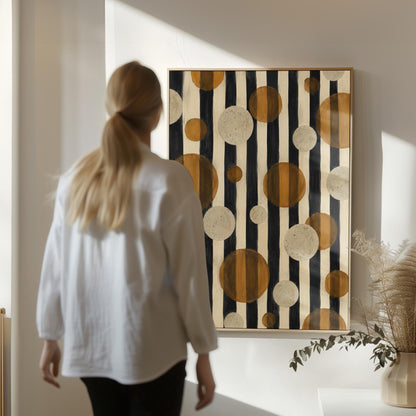 Amber and cream circles scattered over black vertical stripes, canvas print shown to scale in a furnished room
