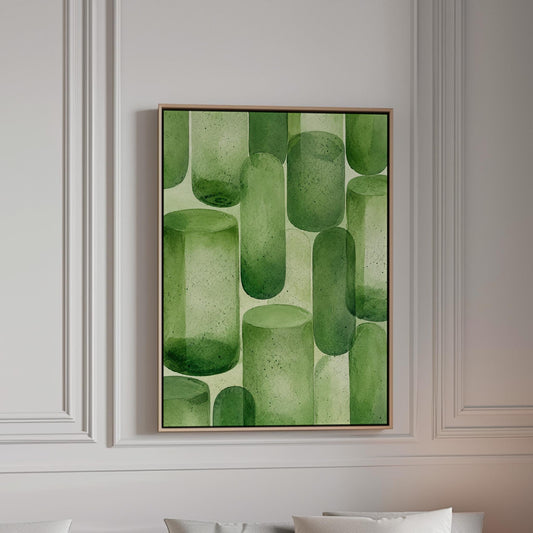 Rounded capsule shapes in layered watercolor greens, canvas print in a bright room with natural daylight