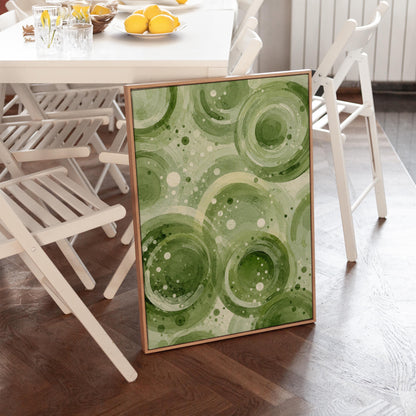 Rings and bubbles swirling in sage green watercolor, canvas print seen in a warm interior with natural light