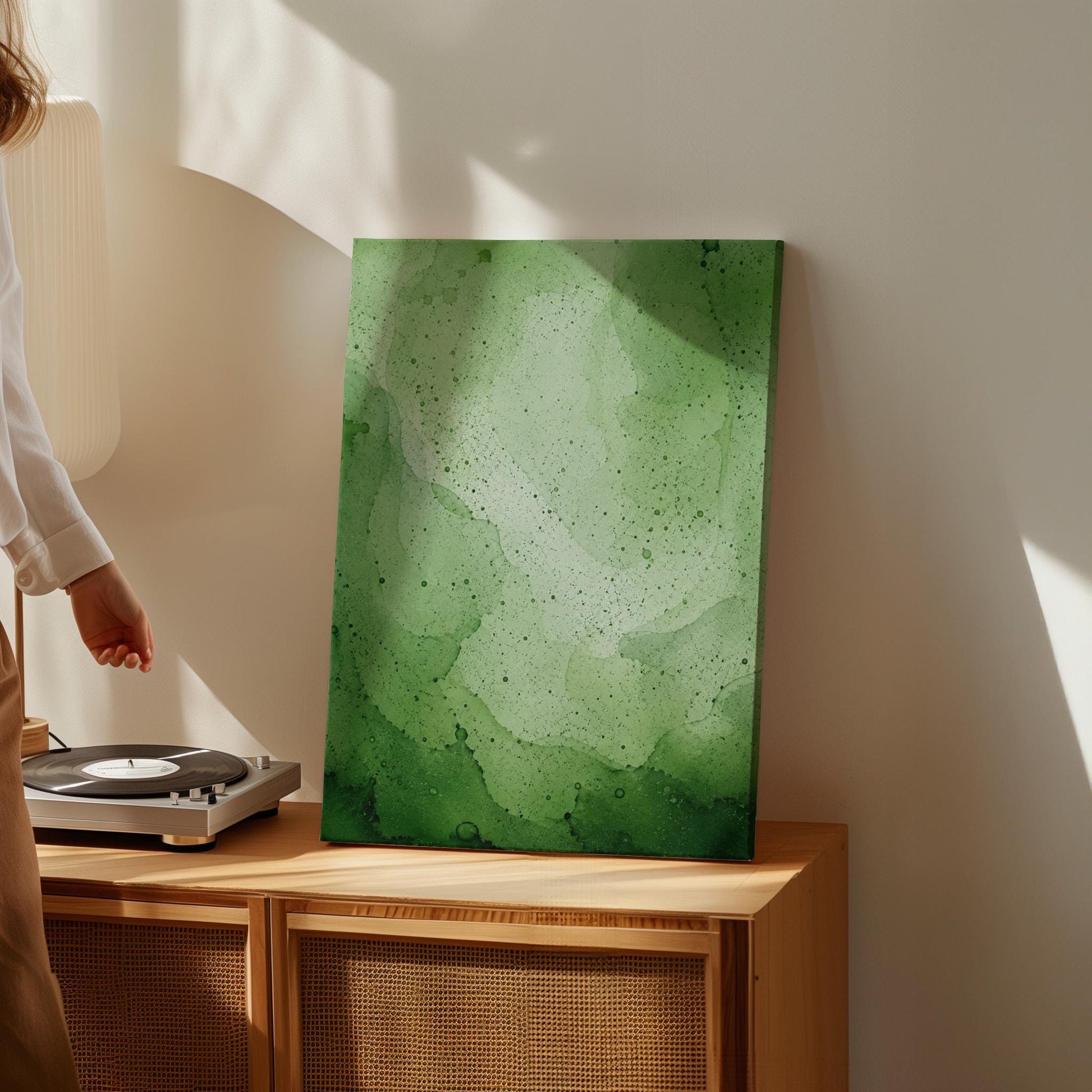 Loose watercolor wash in deep moss and forest greens, canvas print styled against a soft white wall