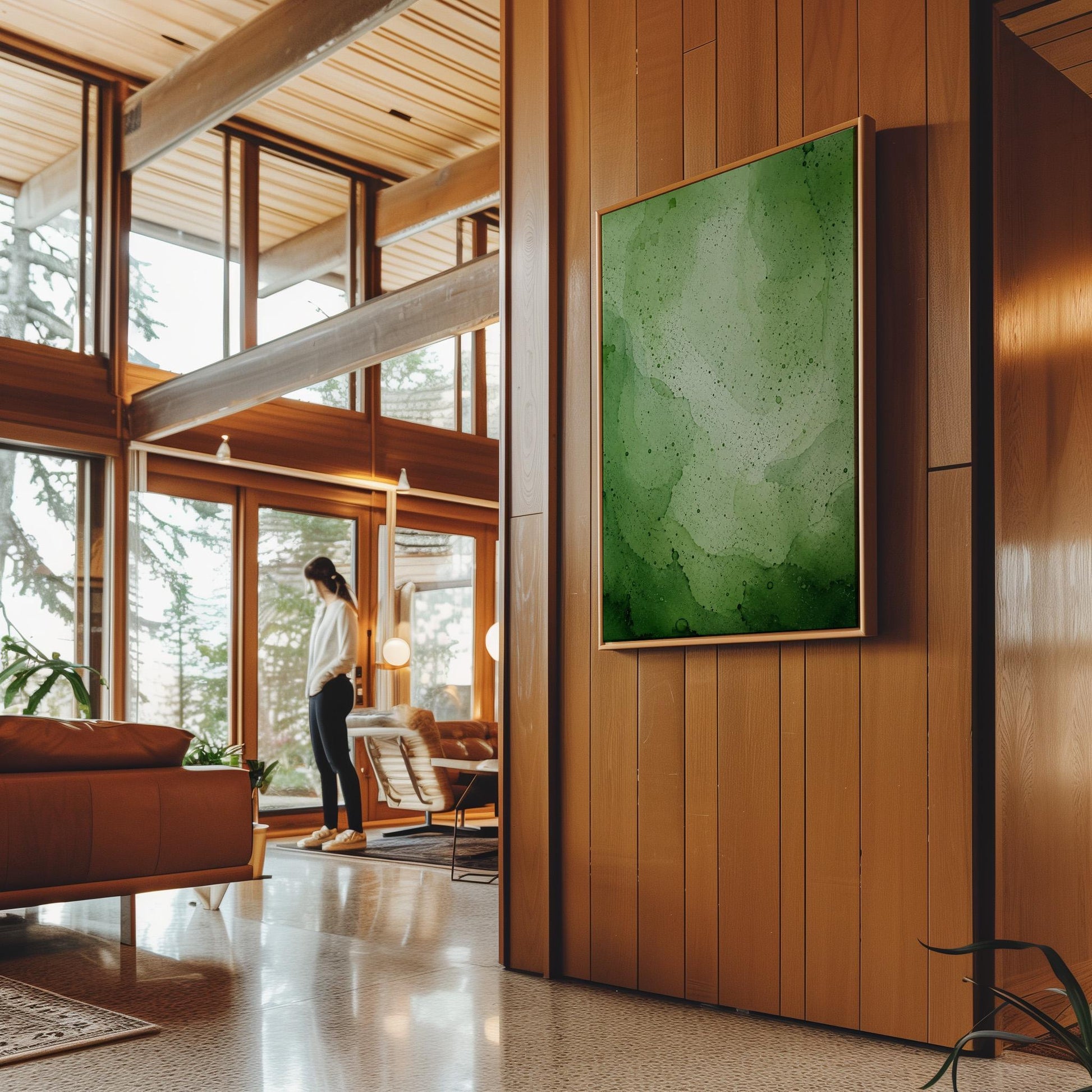 Loose watercolor wash in deep moss and forest greens, canvas wall art hanging in a calm, modern living space