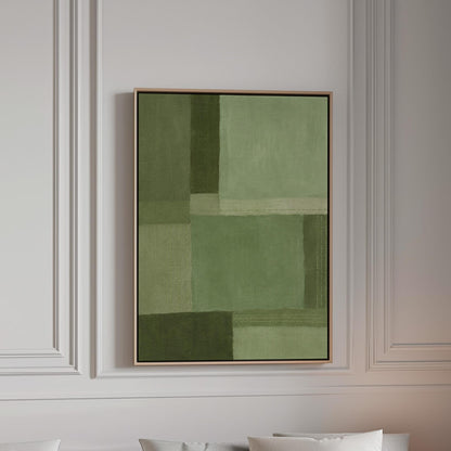 Tonal color blocks in muted sage and olive green, canvas print in a bright room with natural daylight