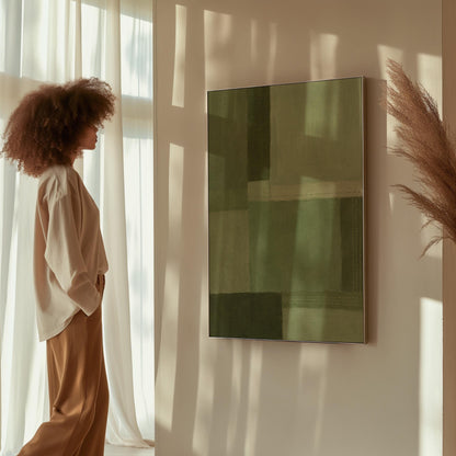Tonal color blocks in muted sage and olive green, canvas print on a quiet wall in a considered interior