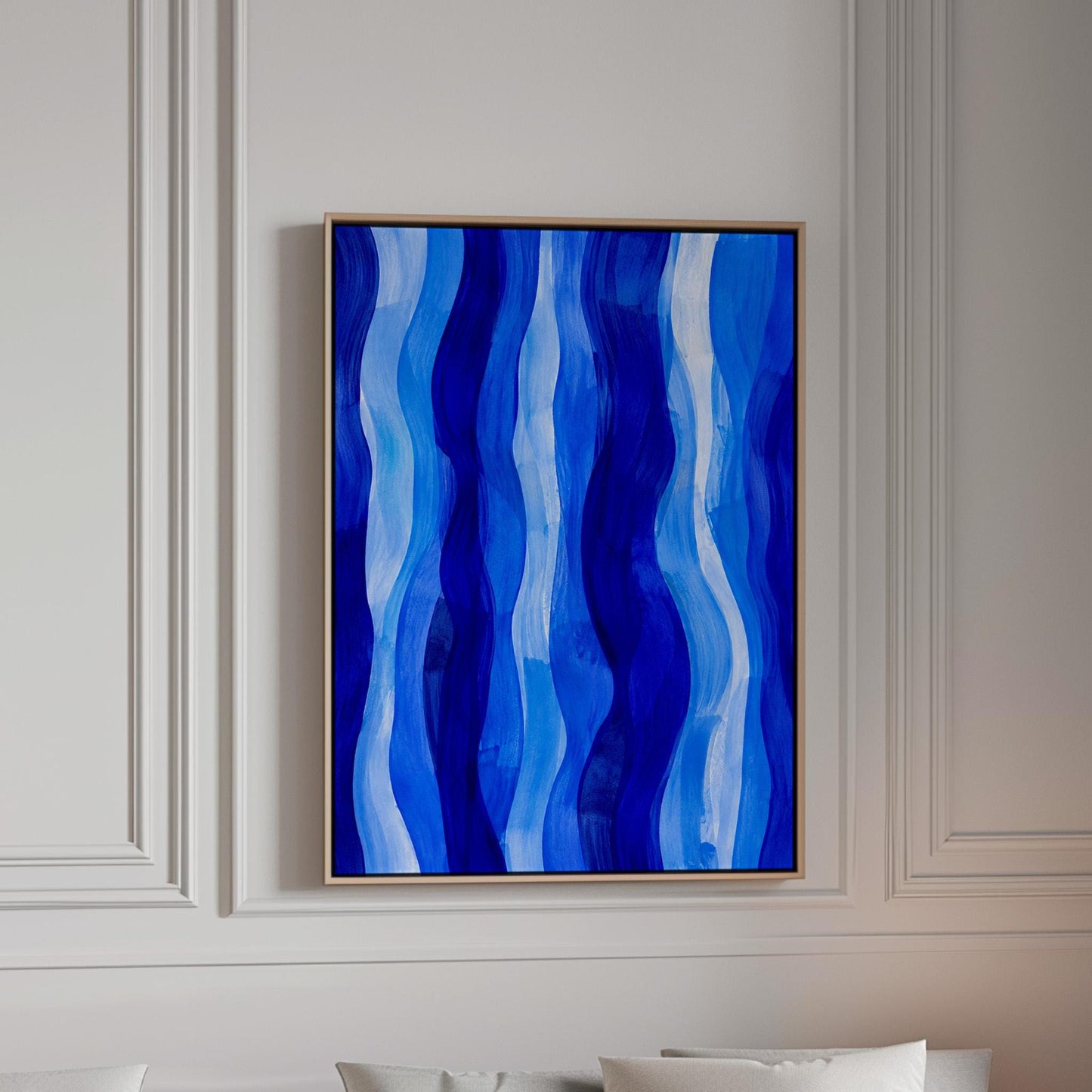 Vertical flowing ribbons in cobalt and light blue, canvas print in a bright room with natural daylight