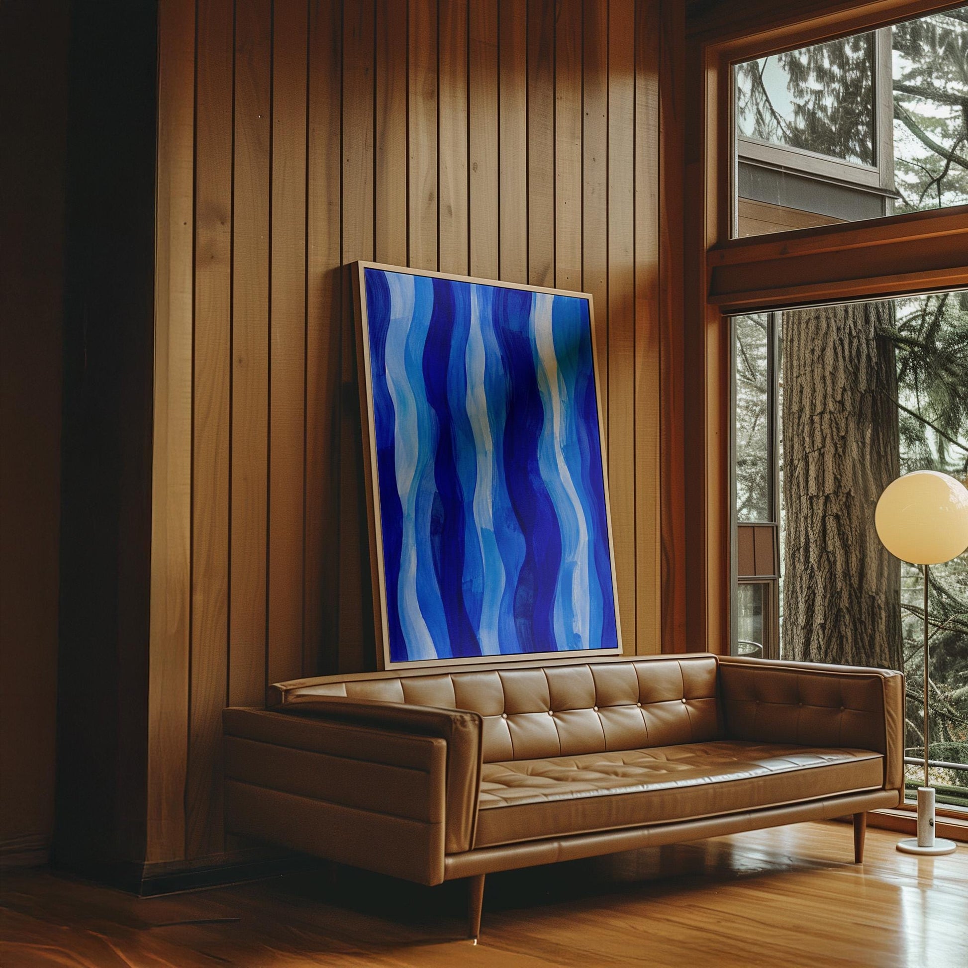 Vertical flowing ribbons in cobalt and light blue, canvas print styled against a soft white wall