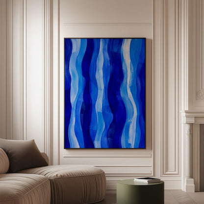 Vertical flowing ribbons in cobalt and light blue, canvas print on a softly lit wall in a calm interior