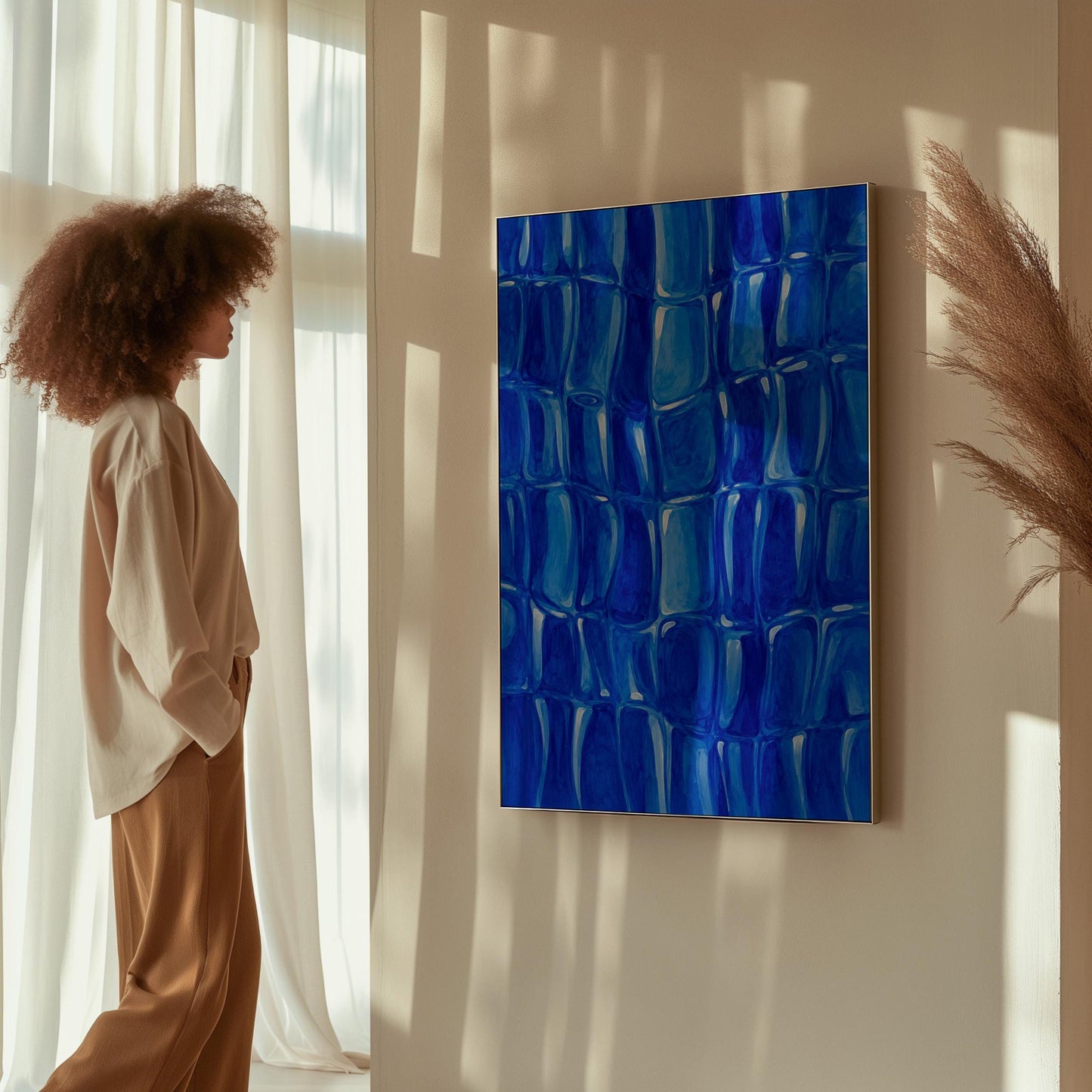 Mosaic of rounded royal blue shapes like cobblestones, canvas print seen in a warm interior with natural light