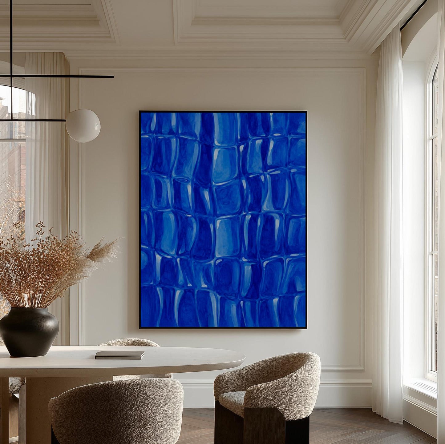Mosaic of rounded royal blue shapes like cobblestones, canvas print presented in a light, minimal room