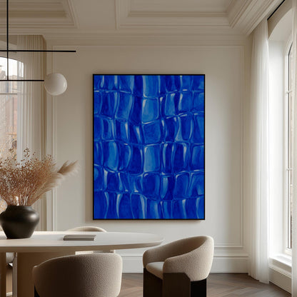 Mosaic of rounded royal blue shapes like cobblestones, canvas print presented in a light, minimal room