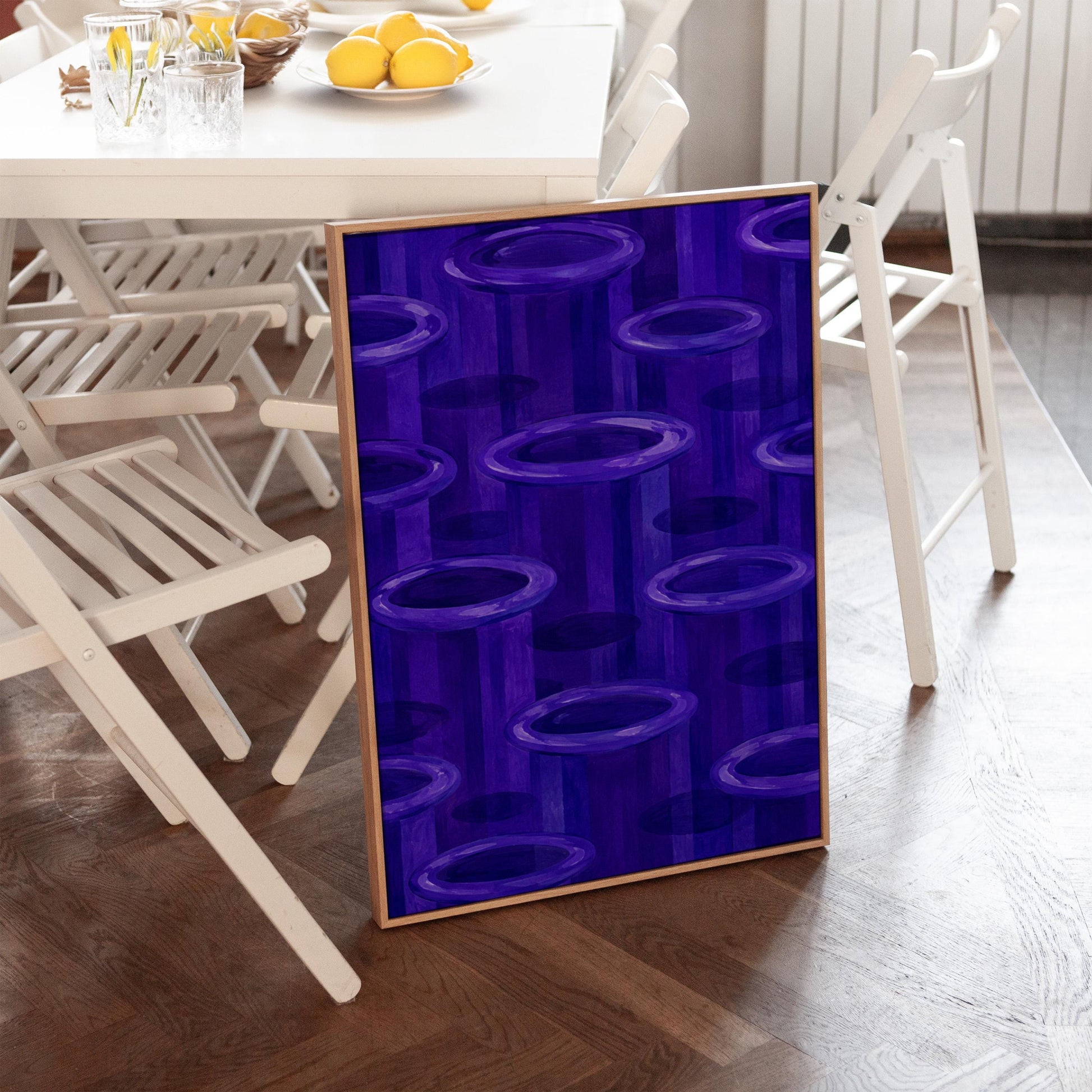 Rings emerging from deep violet and amethyst tones, canvas print styled against a soft white wall