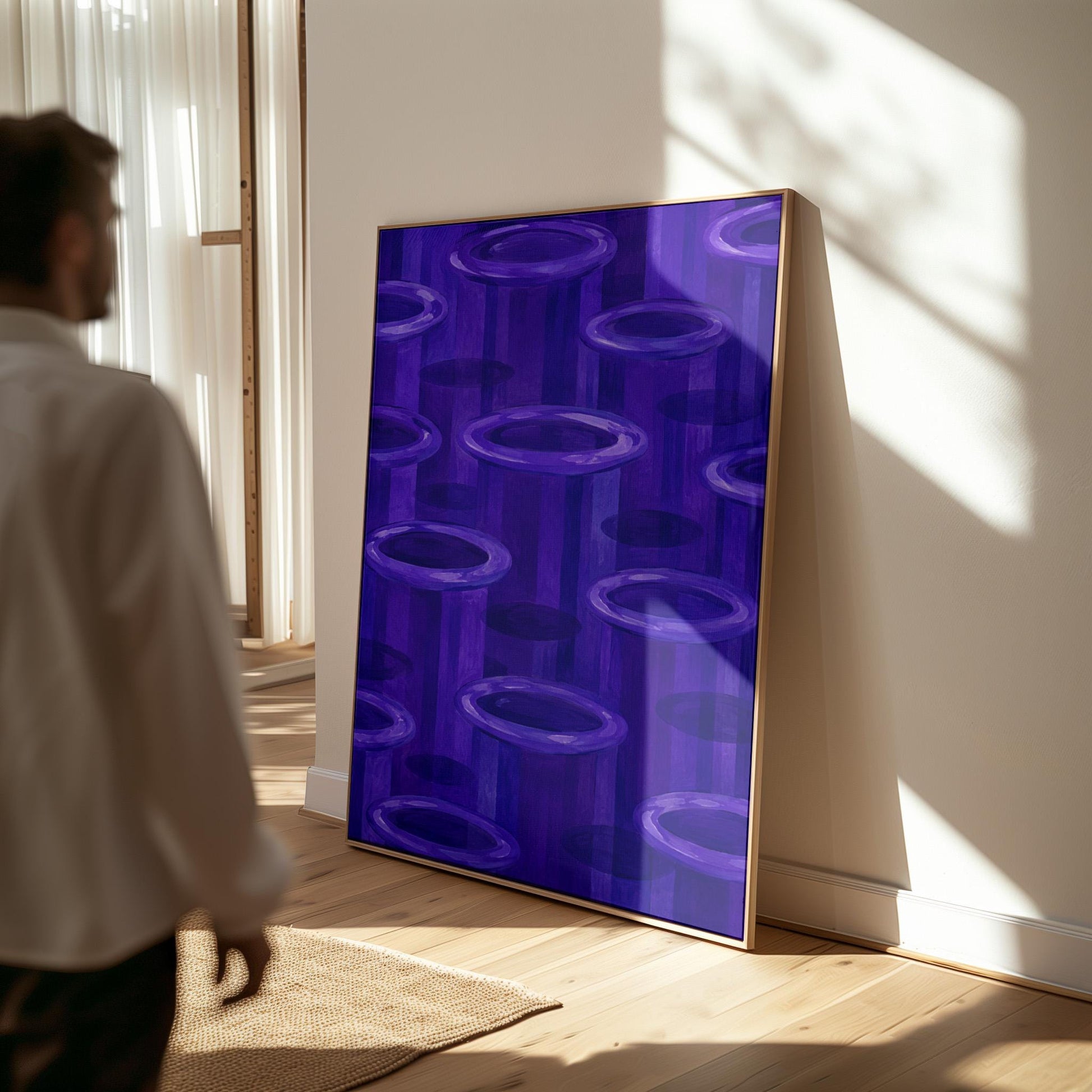 Rings emerging from deep violet and amethyst tones, canvas print seen in a warm interior with natural light