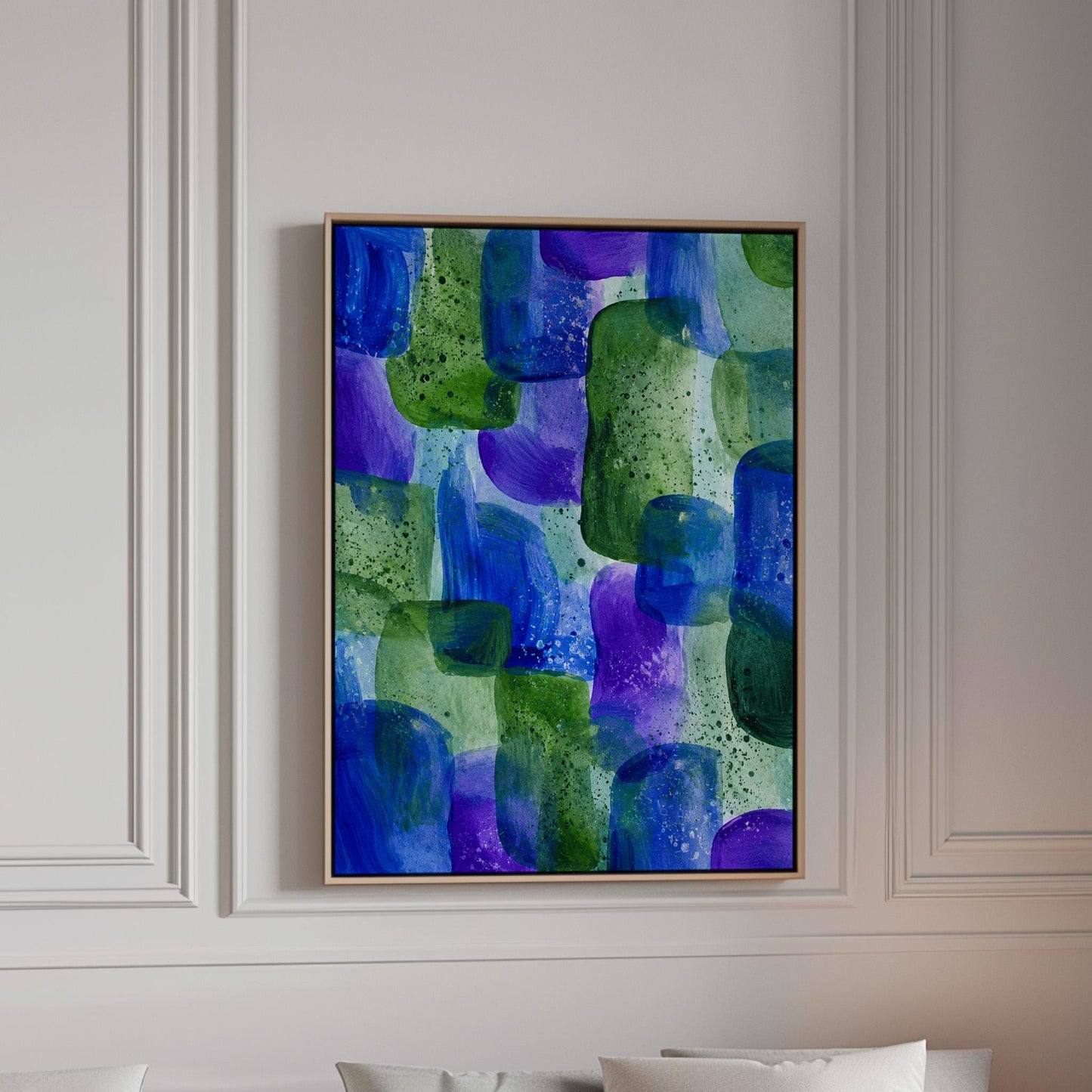 Painterly blocks in saturated blue purple and green, canvas print in a bright room with natural daylight