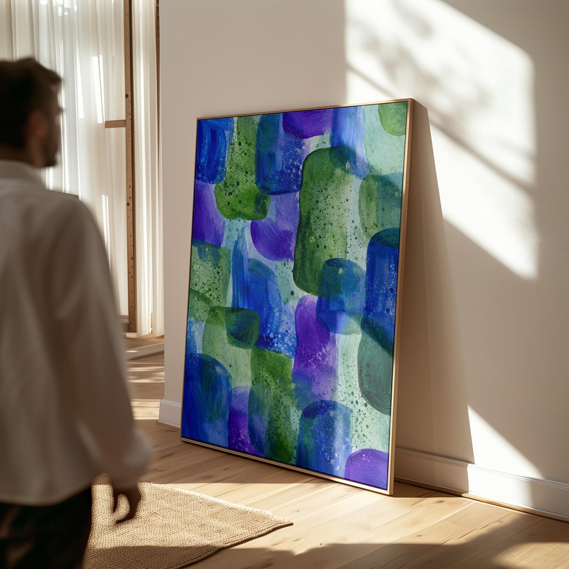 Painterly blocks in saturated blue purple and green, canvas wall art hanging in a calm, modern living space