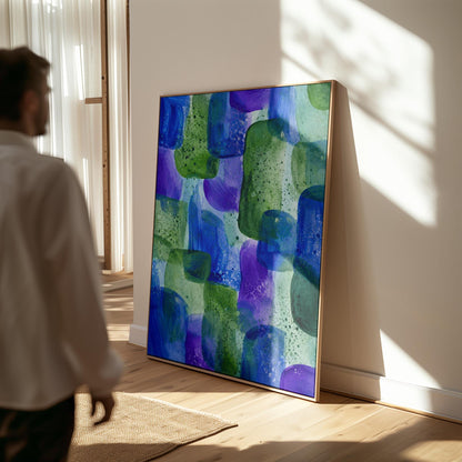 Painterly blocks in saturated blue purple and green, canvas wall art hanging in a calm, modern living space