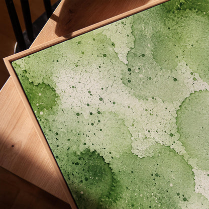 Pale speckled green watercolor wash, light and airy, canvas print in a warm, minimally styled interior