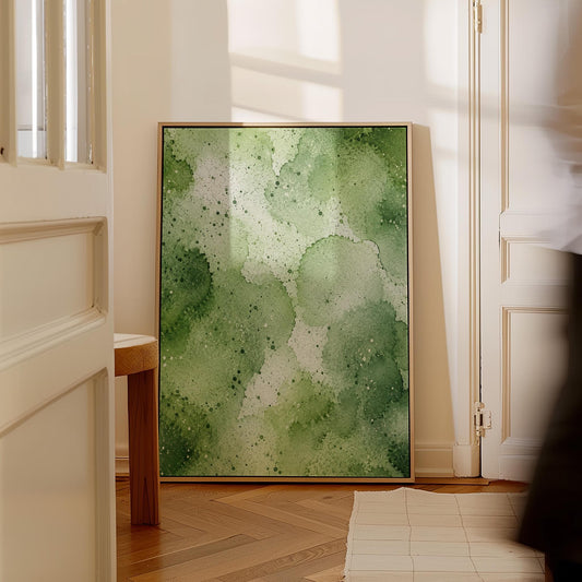 Pale speckled green watercolor wash, light and airy, canvas print hanging in a calm, modern living space