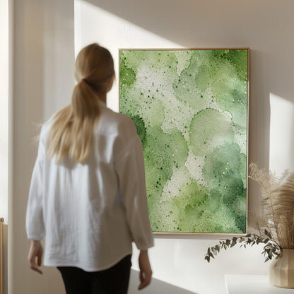 Pale speckled green watercolor wash, light and airy, canvas wall art styled against a soft white wall