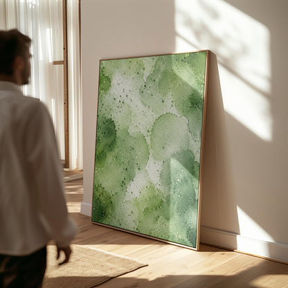 Pale speckled green watercolor wash, light and airy, canvas wall art seen in a warm interior with natural light