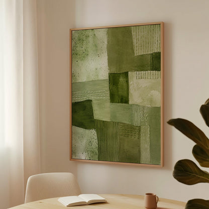 Patchwork of olive and moss green field blocks, canvas print displayed on a neutral wall in a styled interior