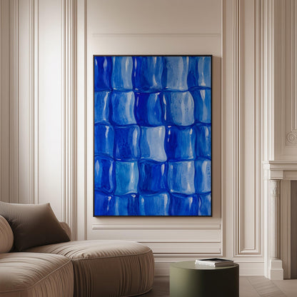 Grid of rounded squares in layered cobalt blues, canvas print on a softly lit wall in a calm interior