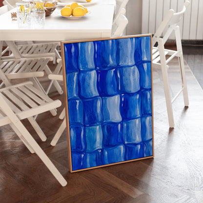 Grid of rounded squares in layered cobalt blues, canvas wall art styled against a soft white wall