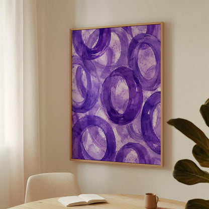 Swirling amethyst purple rings on pale background, canvas print seen in a warm interior with natural light