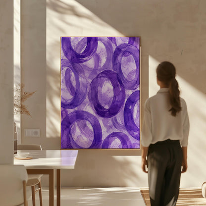 Swirling amethyst purple rings on pale background, canvas print presented in a light, minimal room