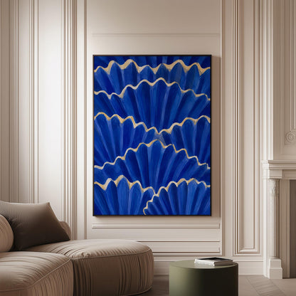 Fan shaped scallop shells in cobalt with gold edges, canvas print on a softly lit wall in a calm interior