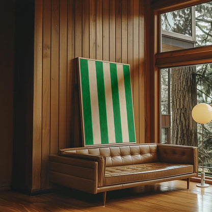 Bold vertical cabana stripes in emerald green and cream, canvas print hanging in a calm, modern living space