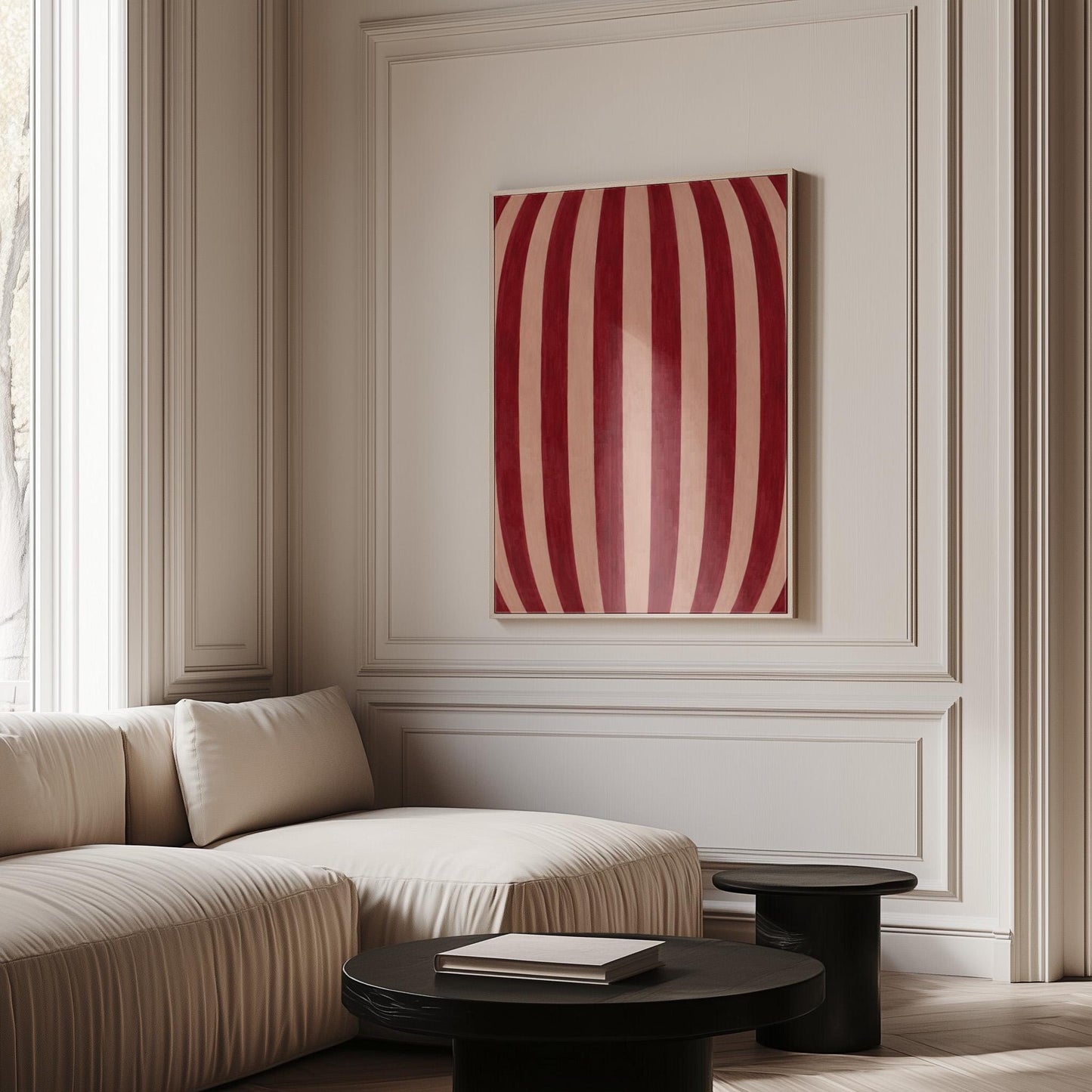 Curved burgundy stripes bowing over blush background, canvas wall art hanging in a calm, modern living space