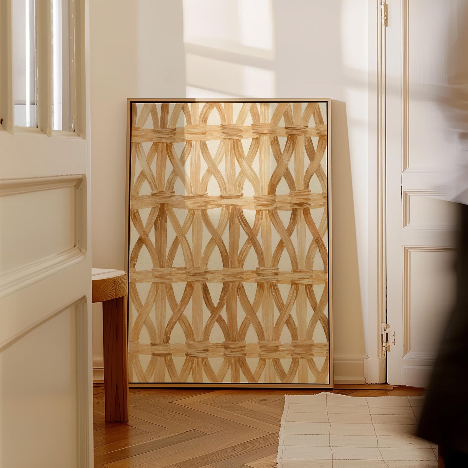 Interwoven rattan lattice pattern in honey beige, canvas print shown in a sunlit, contemporary room