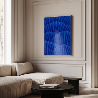 Overlapping pleated fan shapes in deep royal blue, canvas print on a quiet wall in a considered interior