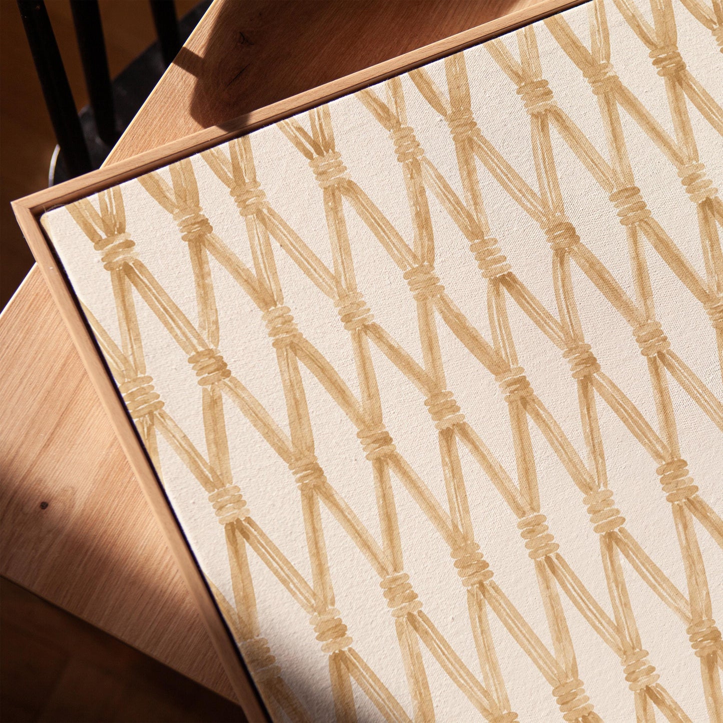 Diamond trellis of natural bands on cream background, canvas print in a warm, minimally styled interior