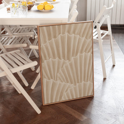 Overlapping fan shells in warm sand and taupe, canvas print styled against a soft white wall