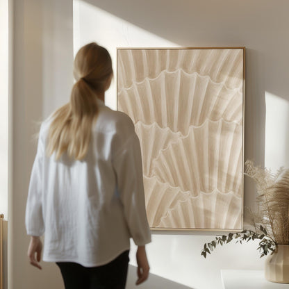 Overlapping fan shells in warm sand and taupe, canvas print shown to scale in a furnished room