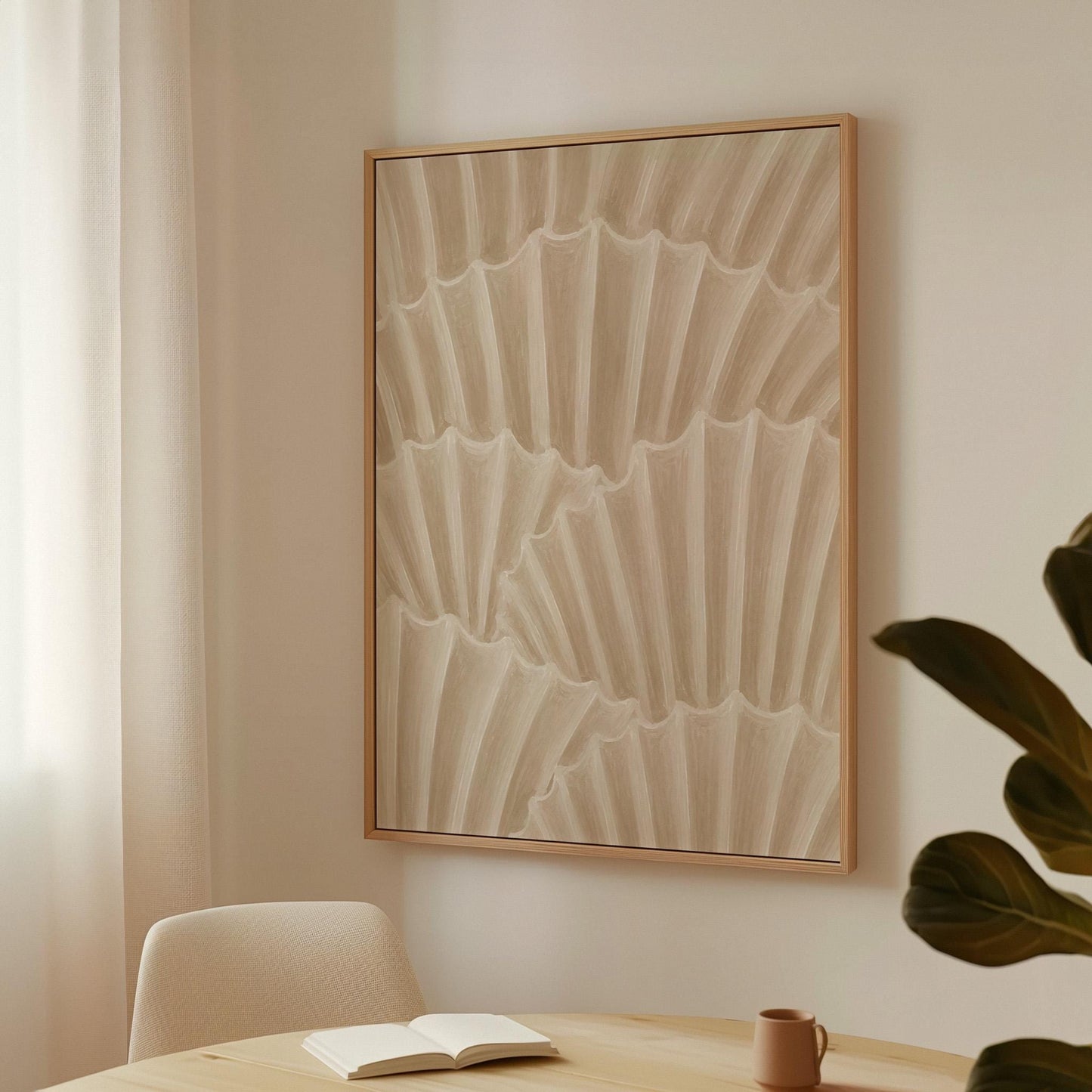 Overlapping fan shells in warm sand and taupe, canvas wall art hanging in a calm, modern living space