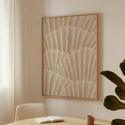 Overlapping fan shells in warm sand and taupe, canvas wall art hanging in a calm, modern living space